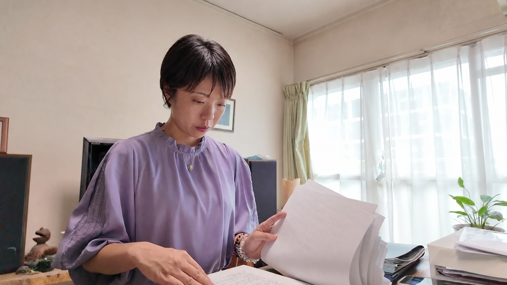 不動産資料を確認しながら可視化パックのヒアリングを行う様子